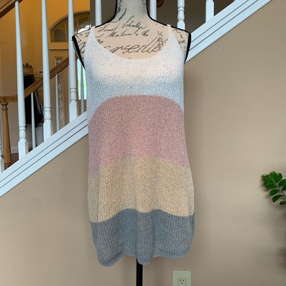 Large size, long spaghetti strap sweater.